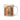 Personalized elf Christmas photo-face mug beside a decorated tree