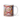 Personalized Mrs Claus Christmas photo-face mug beside a decorated tree