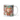 Personalized gingerbread man Christmas photo-face mug beside a decorated tree