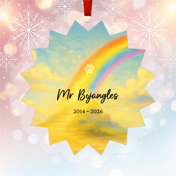Personalized pet memorial star-shaped acrylic ornament with a bright rainbow and golden paw print, engraved with the pet's name and dates