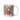 Personalized robin Christmas photo-face mug beside a decorated tree