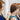 Best friend helps put on necklace – sentimental gift exchange moment with matching jewelry for birthdays or special occasions