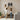 mother and kids hanging custom marshall family name metal wall sign as housewarming gift in new home living room