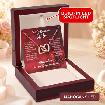 Necklace with heart design in a wooden box with a red card, featuring a built-in LED spotlight.