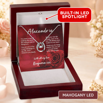 Lucky in Love necklace gift for her — personalized keepsake shown in a mahogany LED gift box