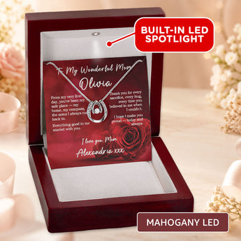 Lucky in Love necklace gift for mom โ personalized keepsake shown in a mahogany LED gift box