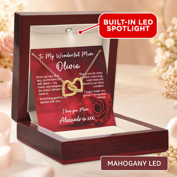 Interlocking Hearts necklace gift for mom โ personalized keepsake shown in a mahogany LED gift box