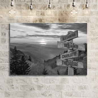 Personalized black and white mountain sunset family signpost canvas with custom family names and locations