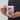 Hand holding a personalized pet gnome Christmas mug so the pet's face design faces out.