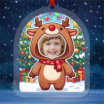 Personalized reindeer Christmas ornament in clear acrylic — a real photo face in a cute reindeer onesie, on a red ribbon