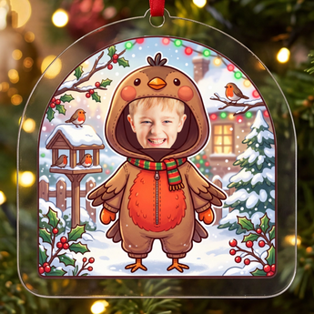 Personalized robin Christmas ornament in clear acrylic — a real photo face in a cute robin onesie, on a red ribbon