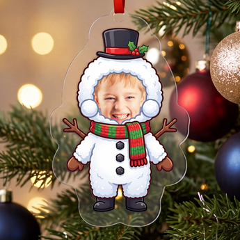 Personalized snowman photo ornament die-cut to the snowman shape in clear acrylic — a real face on a cute cartoon snowman body, on a red ribbon