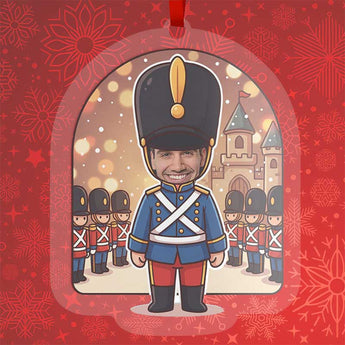 Personalized toy soldier Christmas ornament in clear acrylic, with a photo of a real face on a cartoon toy soldier body, hung by a red ribbon