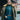 Stylish man wearing fur collar coat sunglasses and layered outfit with gold chain