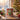 Personalized Christmas tree photo mug on a cosy Christmas table — a real face on a cute cartoon Christmas tree onesie, printed both sides