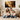 Christian canvas wall art featuring Jesus the Good Shepherd with a lamb, displayed above a smiling family in a warm living room.