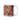 Personalized nutcracker Christmas photo-face mug beside a decorated tree
