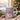 Personalized rabbit photo mug on a cosy Christmas table — a real face on a cute cartoon bunny onesie, printed both sides