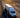 Large white freight truck driving along a highway at sunrise, representing fast shipping and reliable nationwide delivery.
