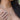 Close-up of woman wearing interlocking hearts necklace meaningful love gift