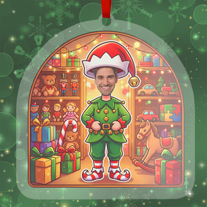 Personalized elf Christmas ornament in clear acrylic, with a photo of a real face on a cartoon elf body, hung by a red ribbon