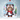 Personalized penguin Christmas ornament in clear acrylic — a real photo face in a cute penguin onesie, on a red ribbon