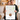 Couple holding an unframed personalized Where We Met map print — a Boise, Idaho street map with a red heart marker and their photo in a circle.