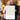 Couple holding an unframed personalized Where We Met map print — a Boise street map in a square with a red heart marker.