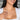 White gold round pendant necklace with cubic zirconia on smiling model wearing white top - perfect anniversary or wife gift